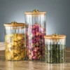 S54d788b9ce2d4d72a1c068d96e4cac52J.webp Glass Storage Jars with Bamboo Lids — Set